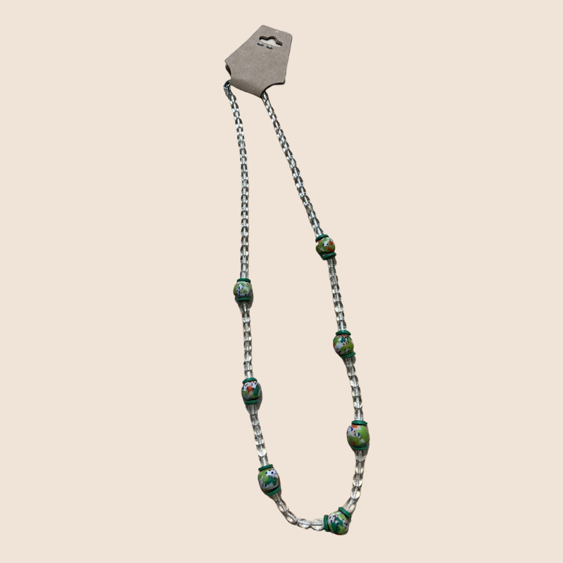 Long necklace with transparent beads and lime green beads