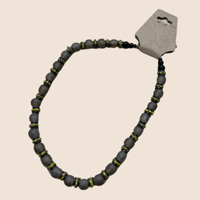 Necklace with gray glass beads and yellow discs