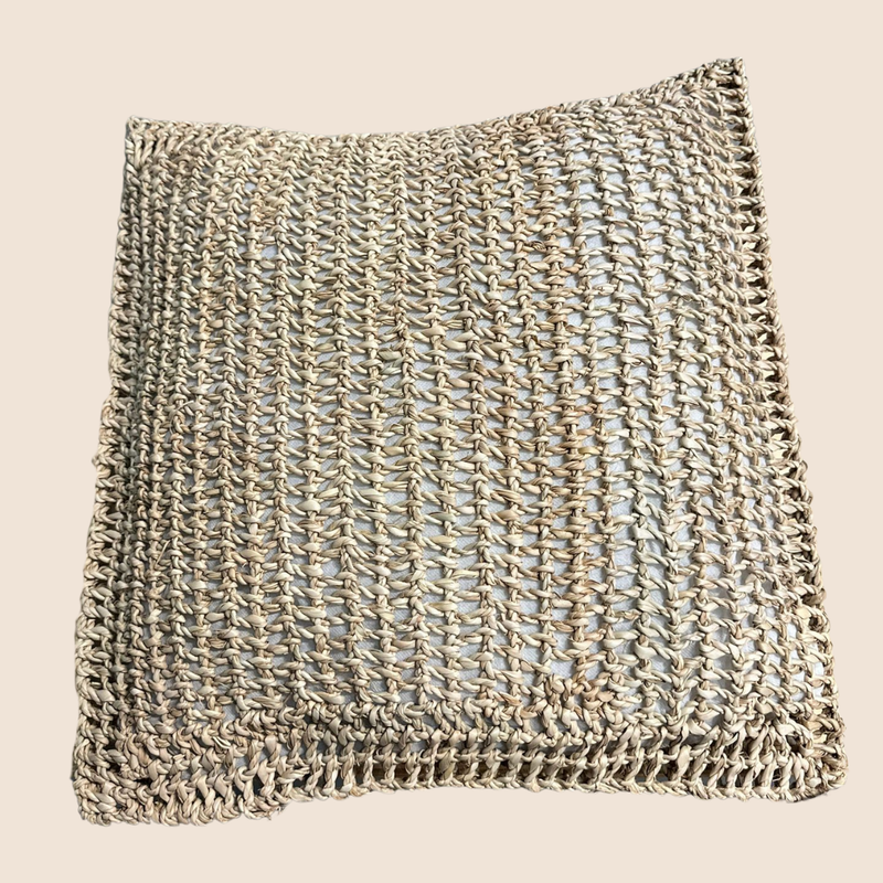 Braided indoor or outdoor cushion made of palm leaf